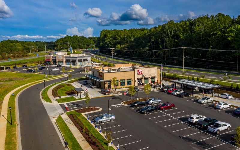 Northwood Ravin Portfolio, Construction, CARRAWAY VILLAGE RETAIL in Chapel Hill, NC, retail shopping mall with plenty of parking and green trees surrounding the area