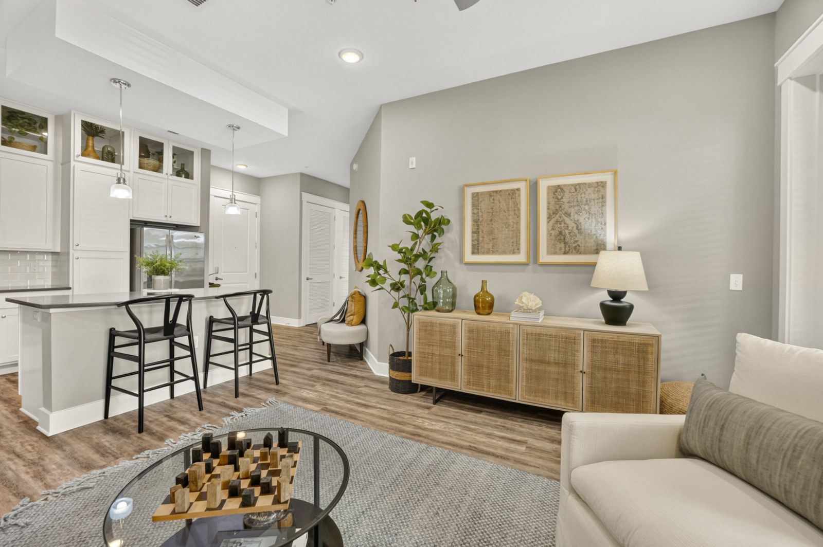 Northwood Ravin Property Management Portfolio, THE LUCENT AT SUNRISE in Kissimmee, FL, multi-family, multi-story apartments with balconies, green grass and palm trees