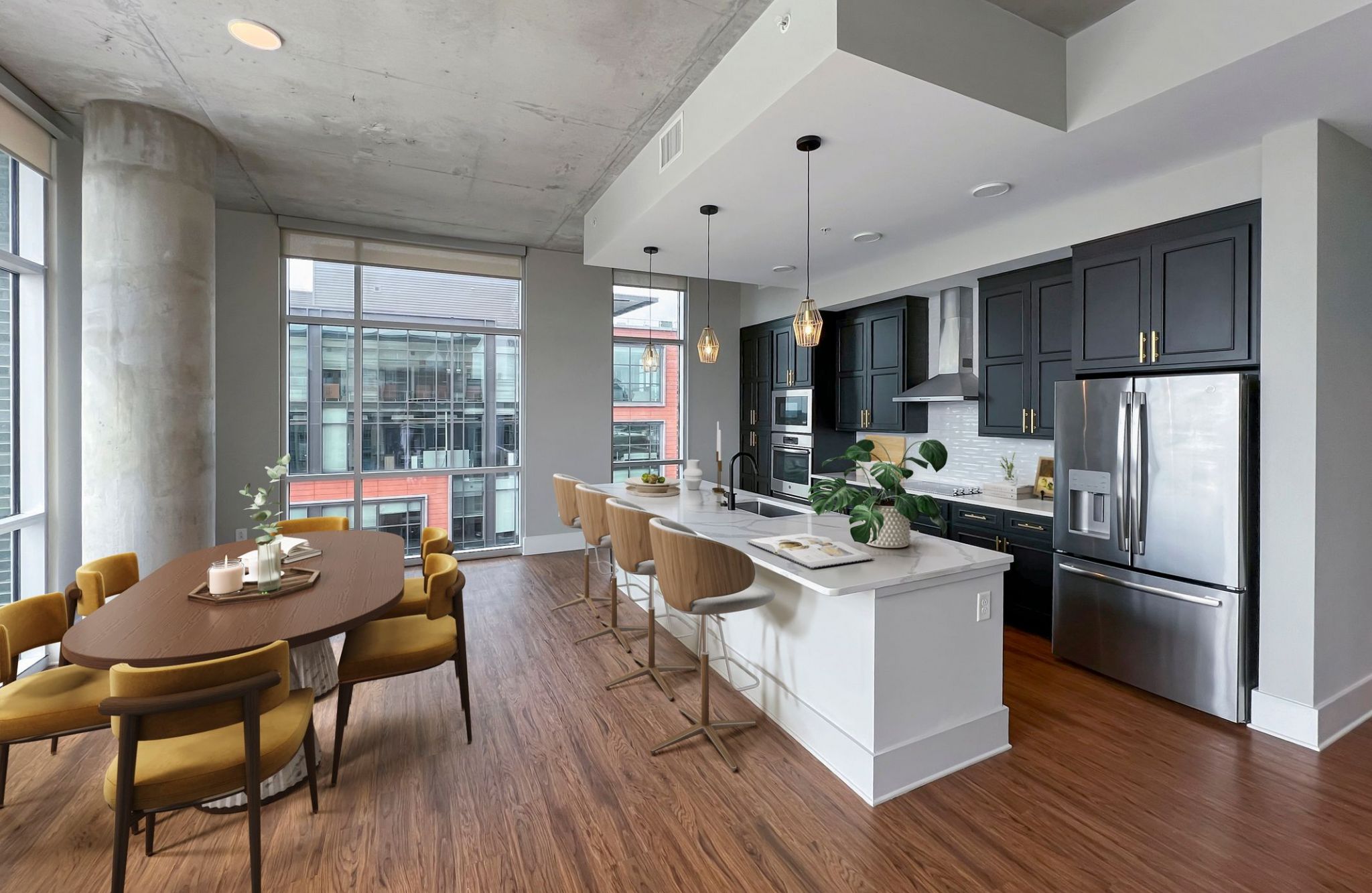 The Vue at Charlotte, NC - beautiful corner unit apartment living and dining area with luxury hard-wood plank flooring, giant full-height windows, and sliding doors